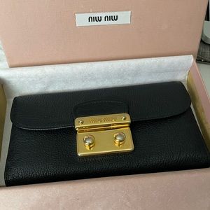 Miu Miu black trifold wallet. Gently used, mint condition. Original box.